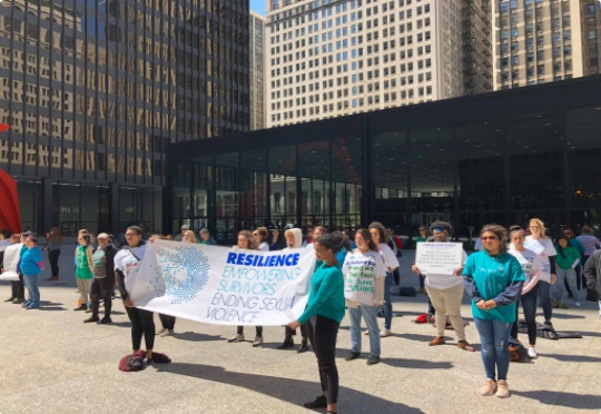 A group of women protest at Federal Plaza, Chicago